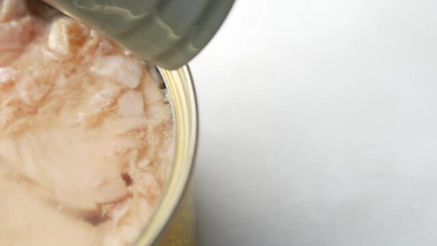 canned tuna on wooden table ,