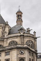 Fototapeta na wymiar Architectural fragments of Paris Saint-Eustache church (Eglise Saint Eustache, 1532 - 1637). Saint-Eustache church located in Les Halles area of Paris. UNESCO World Heritage Site. Paris, France.