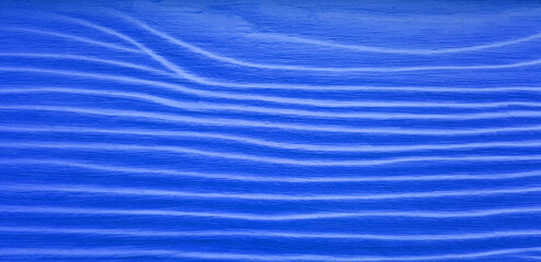 Art of line pattern on blue wooden wall background. Abstract and wallpaper exterior design of wood surface. 