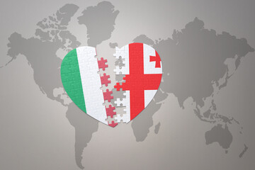 puzzle heart with the national flag of georgia and italy on a world map background. Concept.