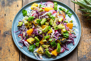 Grilled pineapple, avocado and red cabbage salad