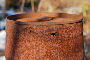 rusty metal, tin, with a hole, old and damaged - obrazy, fototapety, plakaty