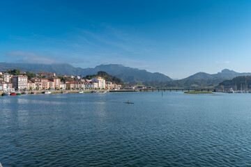 Fototapeta na wymiar view of the city of Ribadesella from the promenade in a sunny day. Asturias. spain