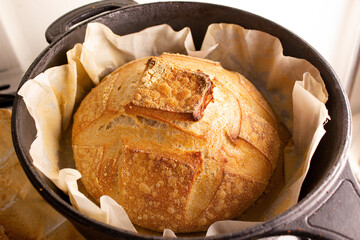 Sourdough Bread isolated on a cutting board. Organic homemade bread. Rustic bread
