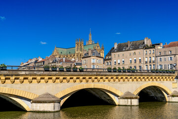 the Moselle River and Moyen Bridge with the historic city center of Metz behind
