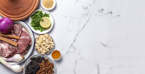 Raw ingredients and spices of traditional lamb stew or tagine