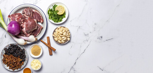 Raw ingredients and spices of traditional lamb stew or tagine