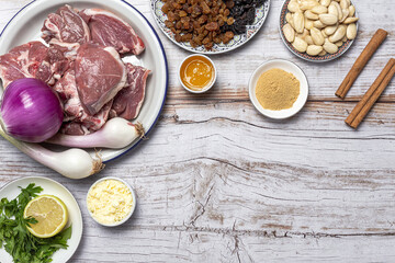 Raw ingredients and spices of traditional lamb stew or tagine