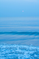Bubbles on golden beach with ocean water in the morning at Thailand beaches. © Birch Photography