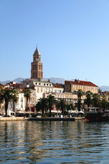 Fototapeta premium Promenade in Split, Croatia with landmark architecture and sailing boats.