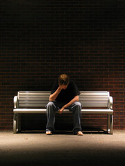 person sitting on a bench