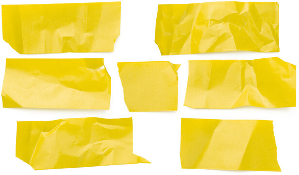 Yellow paper, pieces of crumpled paper. Set of torn horizontal and different sized paper ribbons isolated on white background.