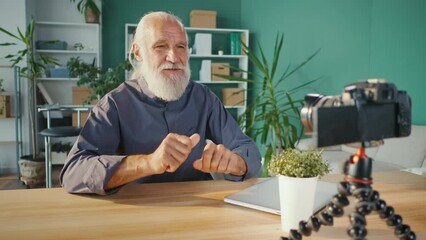 Progressive Older Vlogger Man Recording on Camera New Video Vlog, Having Fun Using New Technologies for Working Online and Communication. Camera Usage, Modern Lifestyle, Tech Concept