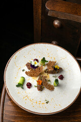 Meat tartat on a plate in a premium restaurant
