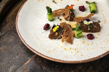 Meat tartat on a plate in a premium restaurant
