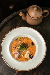 Okroshka on a wooden board 
