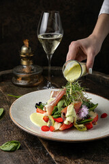 Salad with strawberries, parmesan and prosciutto. 
