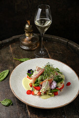 Salad with strawberries, parmesan and prosciutto. 