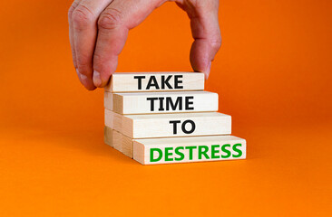 Take time to destress symbol. Concept words Take time to destress on wooden blocks. Beautiful...