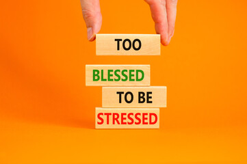 Too blessed to be stressed symbol. Concept words Too blessed to be stressed on wooden blocks. Beautiful orange table orange background. Psychological and too blessed to be stressed concept. Copy space