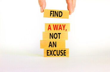 Find a way not excuse symbol. Concept words Find a way not an excuse on wooden blocks on a beautiful white table white background. Businessman hand. Business motivational and not excuse concept.