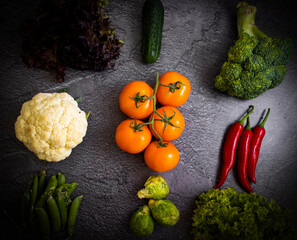 Assortment of fresh vegetables on old background