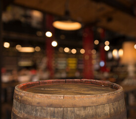 Beer. Still life with Vintage beer barrel and glass light beer. Fresh amber beer concept. Green hop and gold barley on wooden table. Ingredients for brewery. Brewing traditions