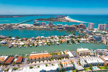 Naklejka na ściany i meble Panorama of Clearwater Beach FL. Florida Beaches. Summer vacations. Beautiful View on Hotels and Resorts on Island. Turquoise color of Ocean water. American Coast or shore Gulf of Mexico. Sunny Day