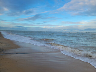 fisherman's beach with clouds and shy sun after rain, Arrial D'Ajuda, Bahia, Brazil