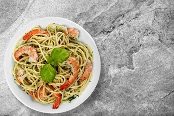 Seafood on plate on gray background. Health food concept.
