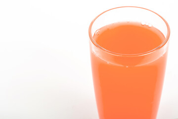 glass of tomato juice isolated on a white background