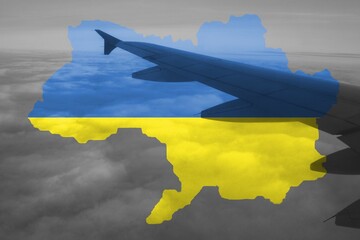 Fly big airplane on Ukraine map background