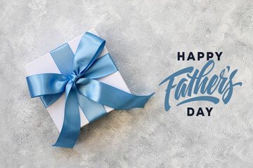 Design concept top view of Father's day gift idea with greeting on gray concrete background.  - Powered by Adobe
