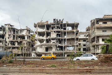 City of Aleppo and destroyed building in Syria