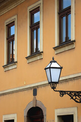 Colorful historical buildings and vintage street lantern in central Zagreb, Croatia.
