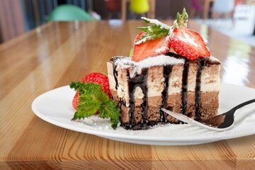 Tasty sweet Cake dessert on the desk