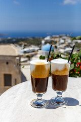 Two glasses of Greek frappe.