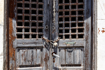 Lock on an old wooden door.