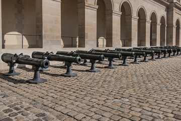 Historic Napoleonic artillery gun near Les Invalides in Paris. Les Invalides (National Residence of...