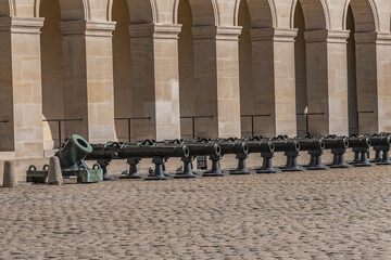 Historic Napoleonic artillery gun near Les Invalides in Paris. Les Invalides (National Residence of...