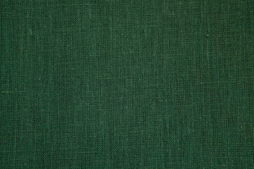 Textured background from natural linen fabric, natural color.