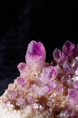 Amethyst purple crystal. The texture of precious and semi-precious stones.