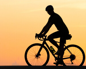 Silhouette profile of a bicycle rider