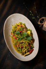 North Sulawesi is rich with traditional cuisines. Dishes from Tanah Minahasa are famous for their super spicy flavors. One of the famous vegetable dishes originating from Manado is Tumis bunga Pepaya.