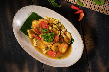 Sweet and Spicy Calamari with Tofu was a very delicious dish with combination of tofu and traditional sweet and spicy bumbu. ou’ll definitely want to pour more over your rice for an extra tangy kick.