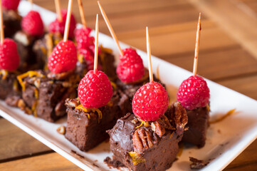 Fudge brownie and raspberry hors d'oeuvres, or appetizers....