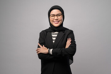 Beautiful muslim woman wearing glasses over white background studio