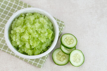Organic cucumber pulp juice, squeezed from a slow juicer, can be used as a face mask, zero waste. Selected focus.
