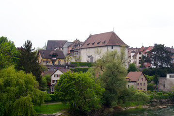 Fototapeta na wymiar Old town of City of Brugg, Canton Aargau, on a cloudy spring day. Photo taken May 6th, 2022, Brugg, Switzerland.