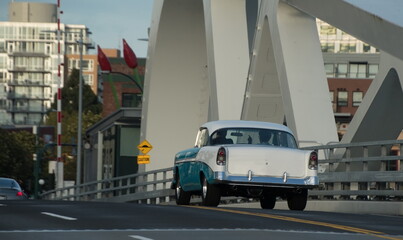 Classic white and blue car on Johnson bridge -2